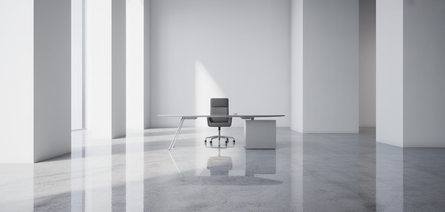 En tom, ren kontorsmiljö med en minimalistisk design, som representerar en ren arbetsplats.